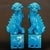 This striking pair of vintage peacock blue glazed porcelain guardian lions brings a bold, elegant presence to any...