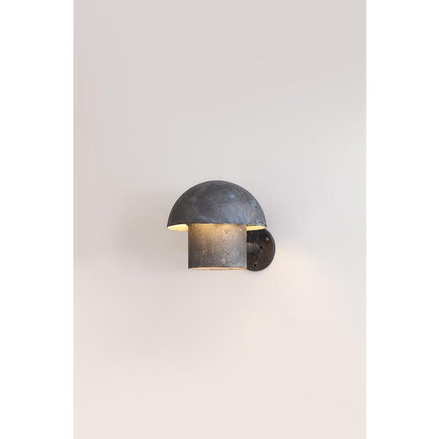 The wall sconce was designed by Bjarne Bech for Louis Poulsen in the 1960s. The piece on offer is an early version in...