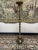 Beautiful vintage freestanding floor lamp with an ornate candelabra-style base, featuring a scroll double shaft and brass...