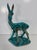 Decorative Italian ceramic sculpture depicting a stylized fawn/deer, finished with a beautiful glossy turquoise glaze...