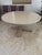 Beautiful Canadel 60 inch round table with 6 chairs in like new condition.