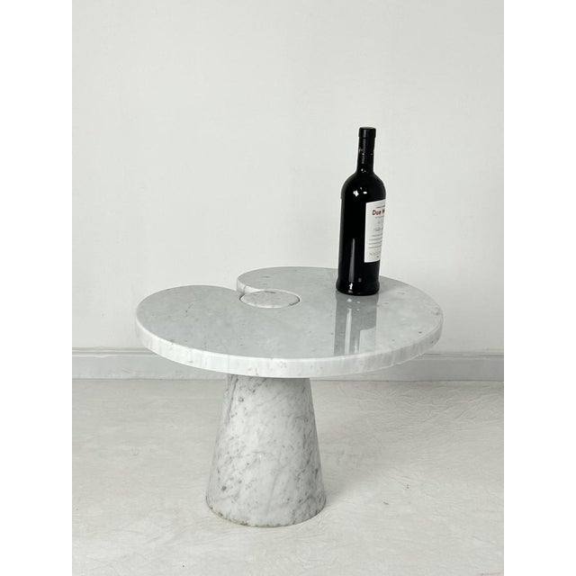 Carrara marble coffee table attributed to Angelo Mangiarotti for Skipper, 1971 This elegant piece consists of a base that...