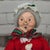 Byers' Choice Carolers Vintage 1985 Mrs. Claus has a red dress with a white laced bottomed apron. She has a festive green...