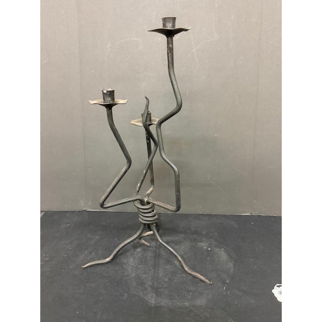 This item is a vintage brutalist-style metal candelabra, often attributed to Danish designer Laurids Lønborg from the...