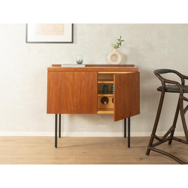 Exclusive home bar Very good workmanshipHigh-quality materialsMade in Germany Width: 106 cm Height: 97 cm Depth: 50 cm...