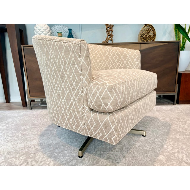 Lexington Upholstery Graves Chair. Polished brass base. Beautiful chair that is in pristine condition with no errors to...