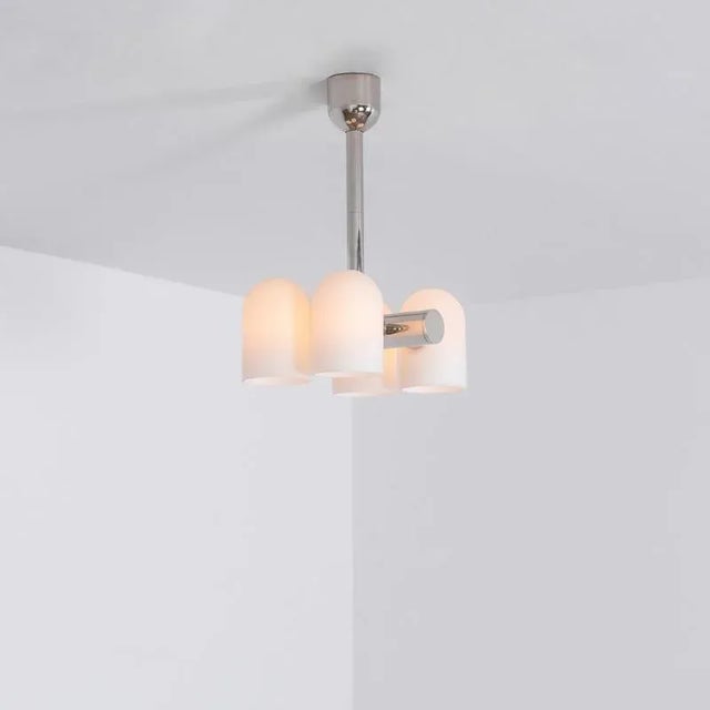 Polished nickel 4 opal bulb chandelier by schwung dimensions: d 31.4 x w 27.3 x h 117.4 cm materials: solid brass, triplex...