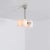 Polished nickel 4 opal bulb chandelier by schwung dimensions: d 31.4 x w 27.3 x h 117.4 cm materials: solid brass, triplex...