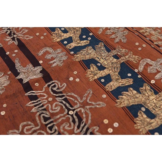 This ceremonial cloth 'Tapis' of Lampung is in silk and cotton with golden strings. A very similar tapis is at the Asian...