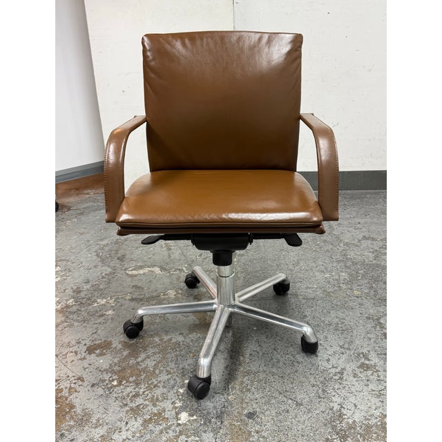 Design Plus Gallery presents the Vitra Office Chair from Roche Bobois. The Vitra Figura brown leather desk chair is a...