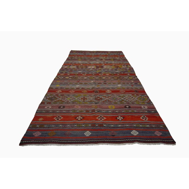 Handwoven vintage kilim rug from Denizli region of Turkey.Approximately 45-55 years old. In good condition.