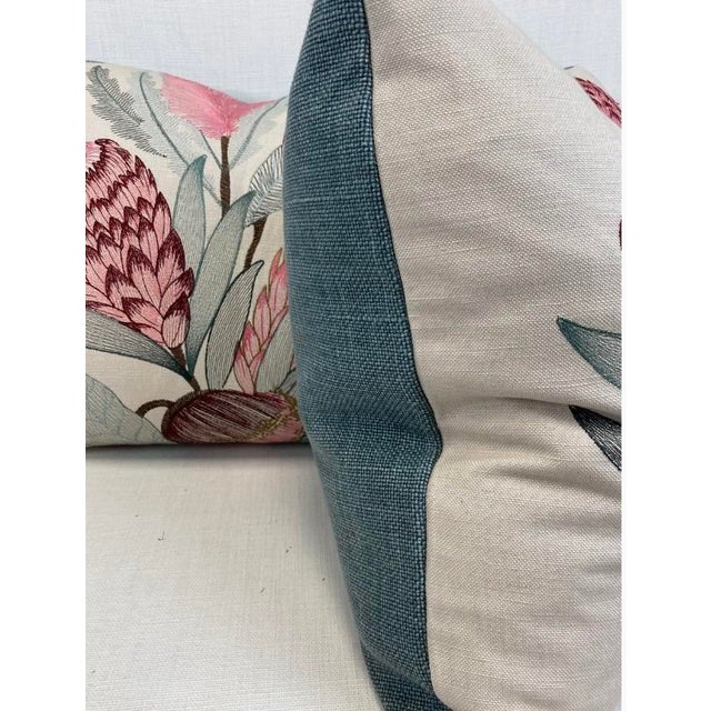 Custom pair of 22" pillows covered in Vervain "Sugarbush" in pink begonia and backed in a coordinating blue Belgium linen....