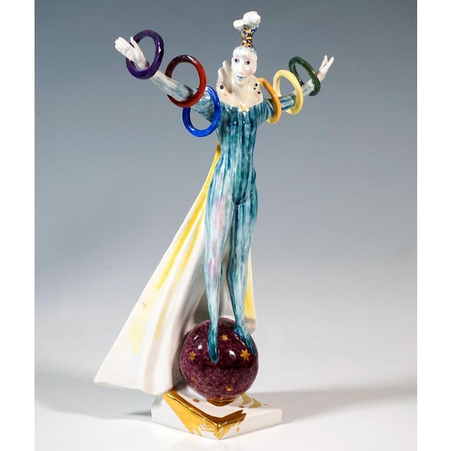 Excellent meissen porcelain figurine: acrobat with highly coiffed curls and feather headdress, wearing a skin-tight full-...