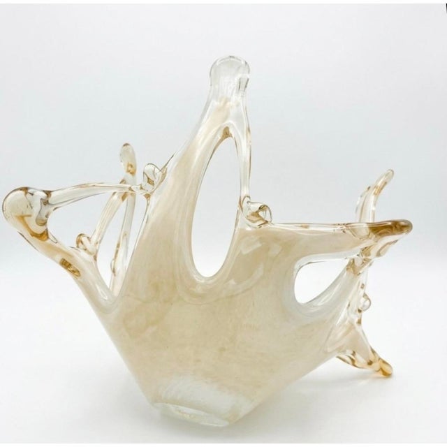 Elevate your tablescape with a breathtaking piece of mid-century Italian artistry. This spectacular vintage Murano glass...