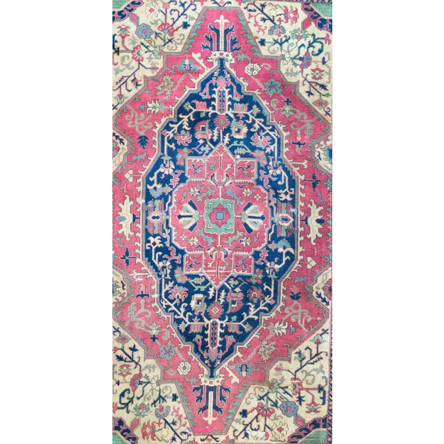 This early 20th-century Persian Sparta rug is a captivating example of the rich weaving tradition from Isparta, a historic...