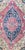 This early 20th-century Persian Sparta rug is a captivating example of the rich weaving tradition from Isparta, a historic...
