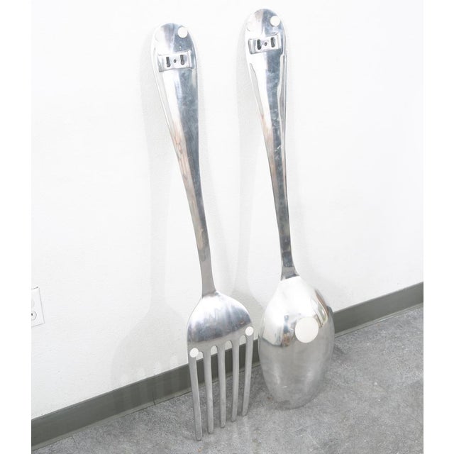 Oversized Pop art wall hanging fork and spoon in a similar style of Curtis Jere. Each piece has brackets for easy wall...