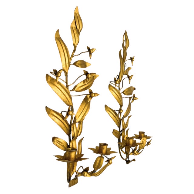 Captivating pair of vintage Italian gilt tole floral wall sconces featuring beautifully sculpted leaves and delicate...