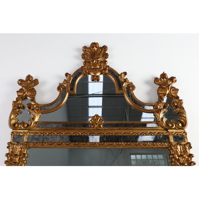Belgium / 1980 / Mirror / wood / Rococo / Venetian A lavish 20th-century wall mirror crafted in Belgium, blending Rococo...