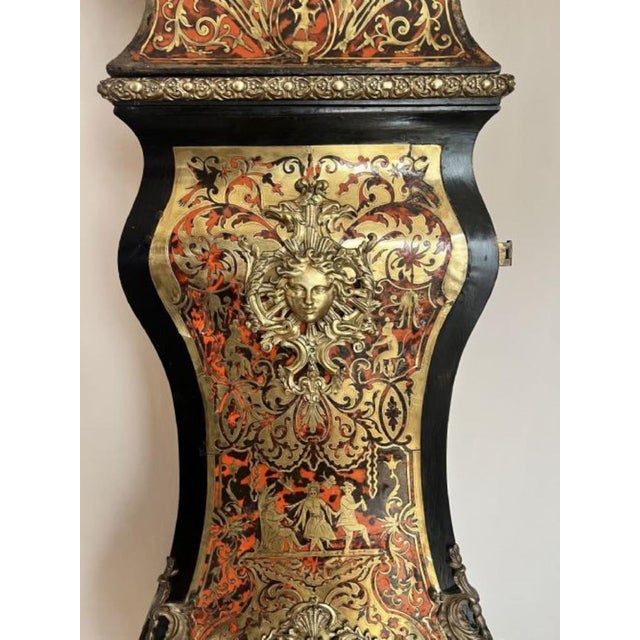 Fantastic quality Napoleon III Marquetry inlaid eight day longcase clock having a quality bombe shaped case finely inlaid...