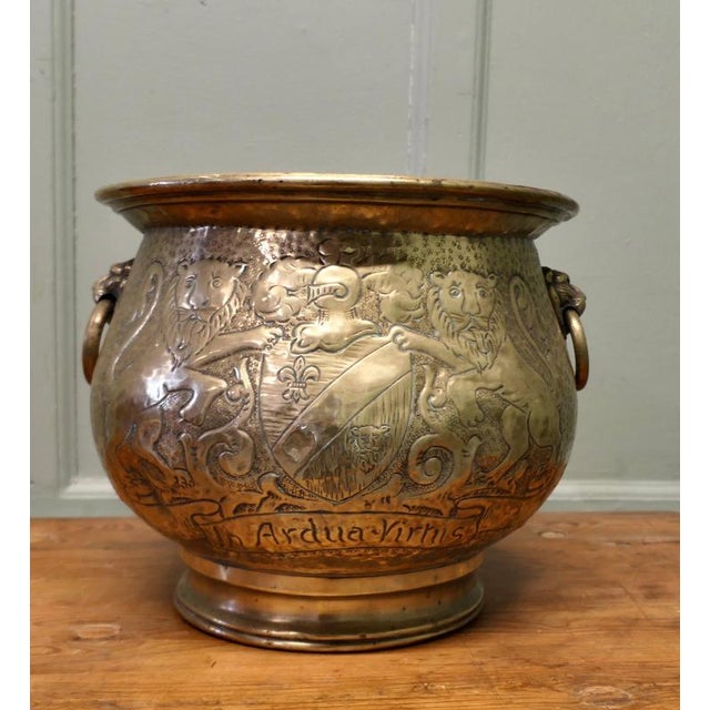 19th Century Gothic Brass Jardiniere with Shields This is a very old piece it is decorated with Lions and Shields and it...
