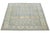 This square hand-knotted wool rug has a blue background adorned with multicolor accents all-over designs. This rug...