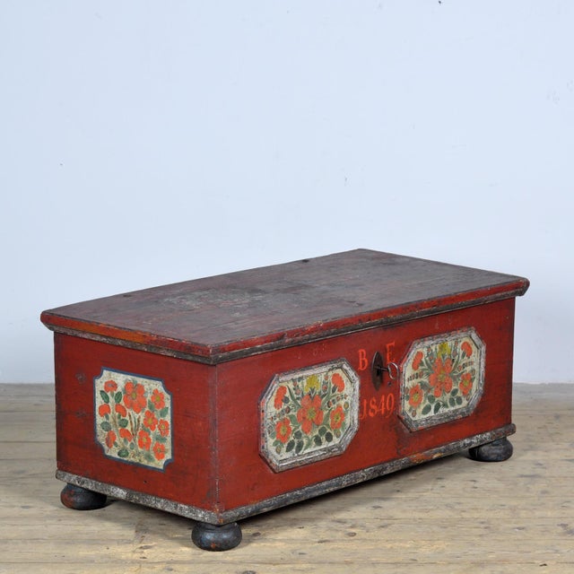 A pine wedding chest from 1849. The illustrations are traditional with images of flowers and tulips. The chest was part of...