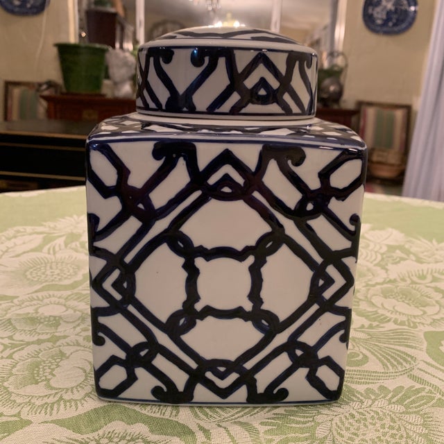 Here we have a pretty blue and white porcelain tea caddy or ginger jar. Hand painted geometric design. Excellent...