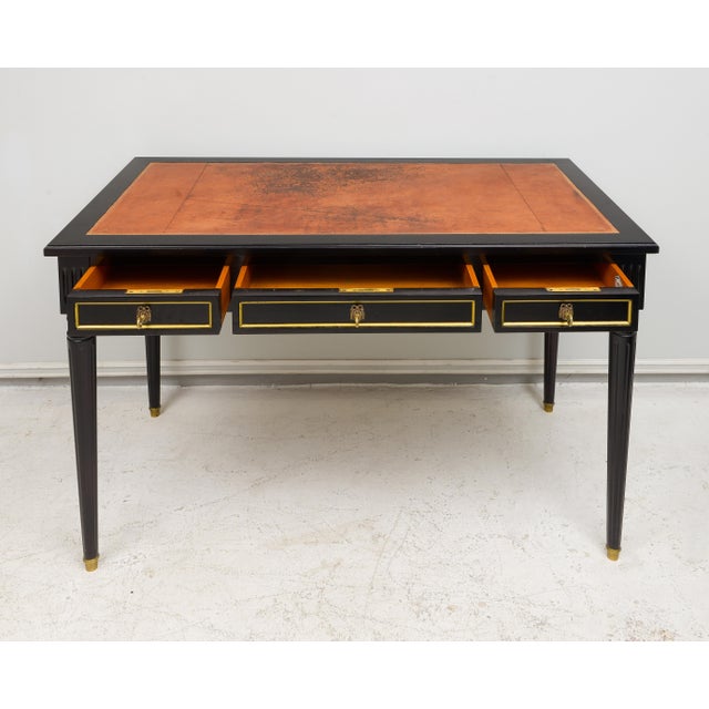 Vintage French Leather Top Bureau Plat Desk with pull-out slides. The table extends 12.5" on each side for a total of...