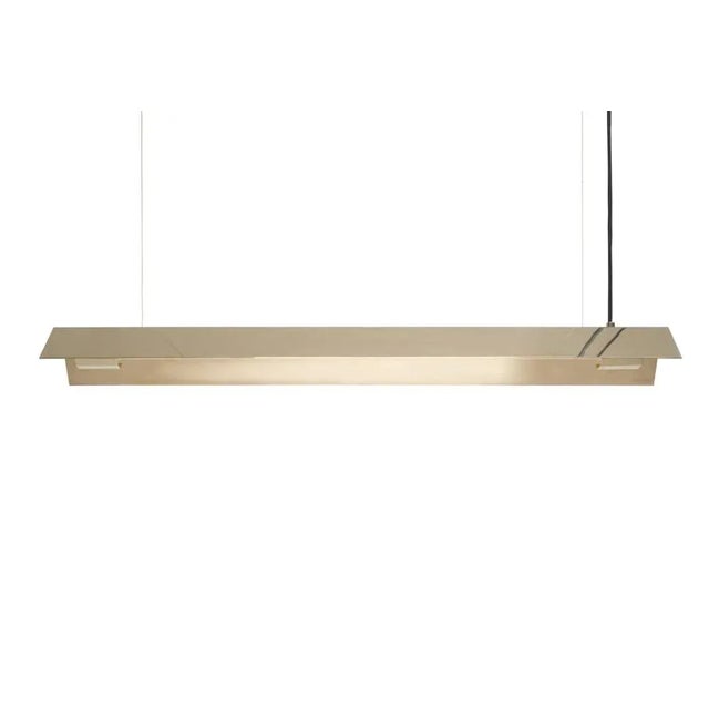 Medium misalliance solid brass suspended light by lexavala dimensions: d 16 x w 100 x h 8 cm materials: brass. There are...