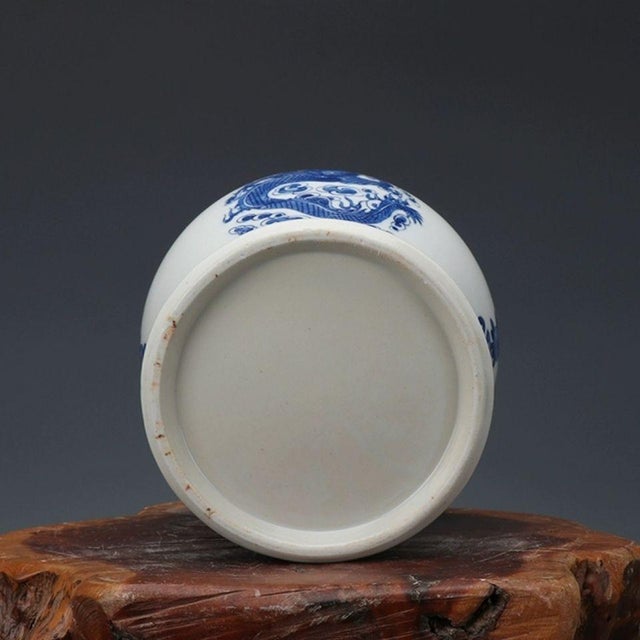Beautiful Chinese blue‑and‑white lidded general jar, decorated with dragon and phoenix roundel motif. Dragon and phoenix...