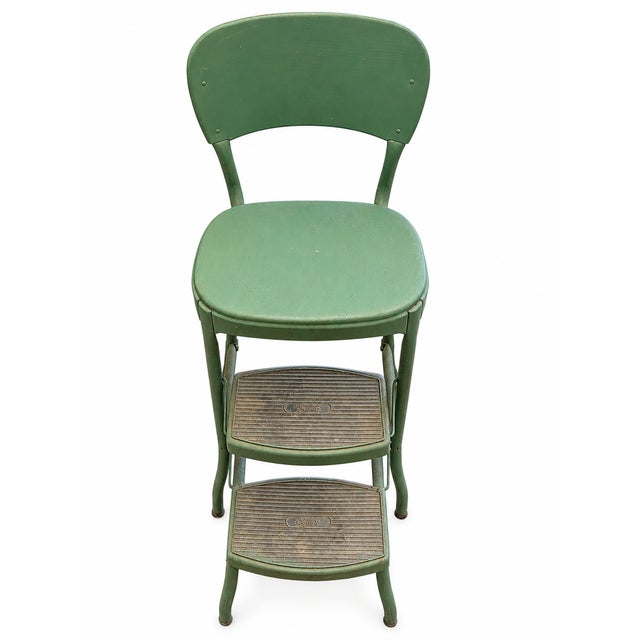 A distinctive vintage Stylaire folding chair with a wonderful 1950s-era look, featuring its original green color and...