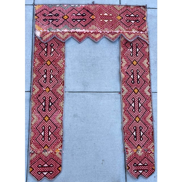 On offer is this beautiful antique wool tribal tent door hanging. A great way to transform any space.