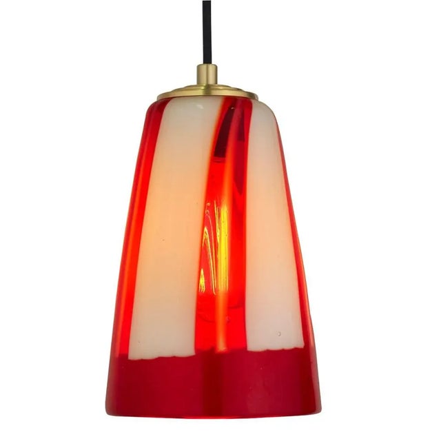A modern accent for the best-looking rooms, this stunning glass pendant is mouth-blown in Venice, Italy. There will always...