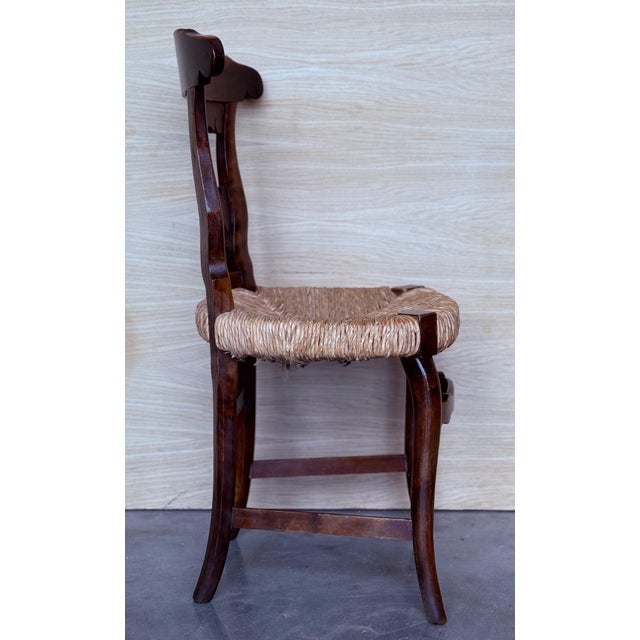 19th set of six dining chairs with wide cane seats. Very comfortable chairs. We have four matching armchairs