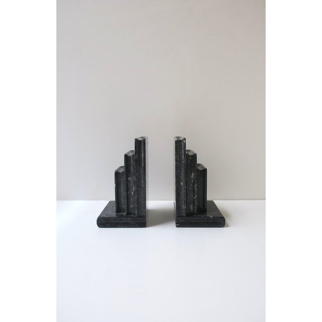 A substantial pair of Italian black and white marble 'book' bookends, in the modern style or Italian Midcentury Modern...