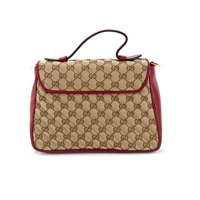 Brand: Gucci Gender: Ladies Length: 10.25 inches Height: 7.50 inches Depth: 4.00 inches Weight: 669.50 grams Gucci GG...