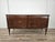 An elegant vintage oak chest of drawers dating back to the 1960s, characterized by refined decorative taste and...