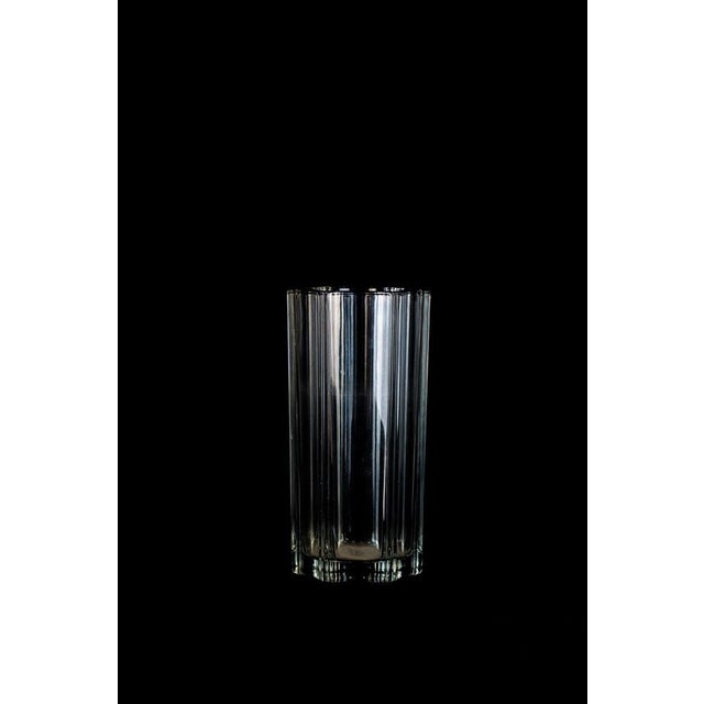 Polyhedral Glass Vase is a beautiful glass decorative object, realized by an italian manufacture during the 1970s. Very...