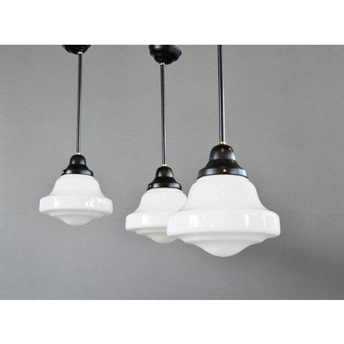 Art Deco Acorn Opaline Lights by Edison Circa 1930s - Stepped opaline glass in acorn shape - Original gallery stems and...