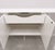 This vintage mirrored credenza has a great glam look with four mirrored cabinet doors, white laminate sides with lucite...