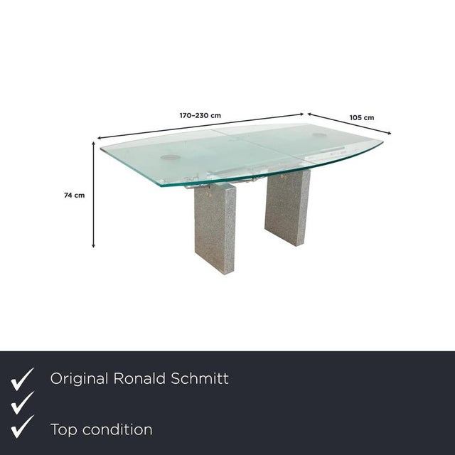 The Ronald Schmitt K5000 glass dining table combines modern design with sophisticated functionality. The tabletop measures...