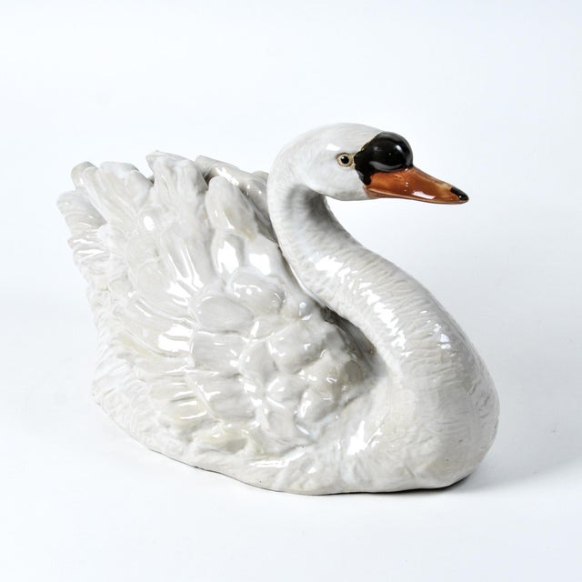 Incredible 17" vintage ceramic swan figure perfect as a centerpiece in many decorative applications and home styles. An...