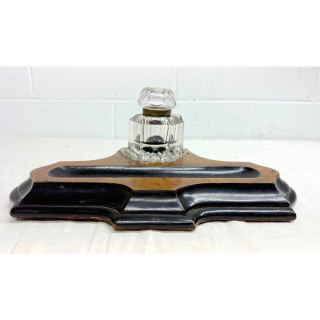 This antique 19th century handmade European wood and glass inkwell stand is a unique and well made piece, perfect for...