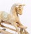 This is a beautiful vintage French blond polychromed rocking horse, circa 1940 in date. The intricately carved and hand-...