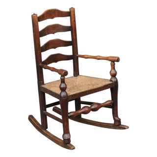 English 1800s Georgian Period Plum Wood Child's Rocking Chair with Rush Seat For Sale