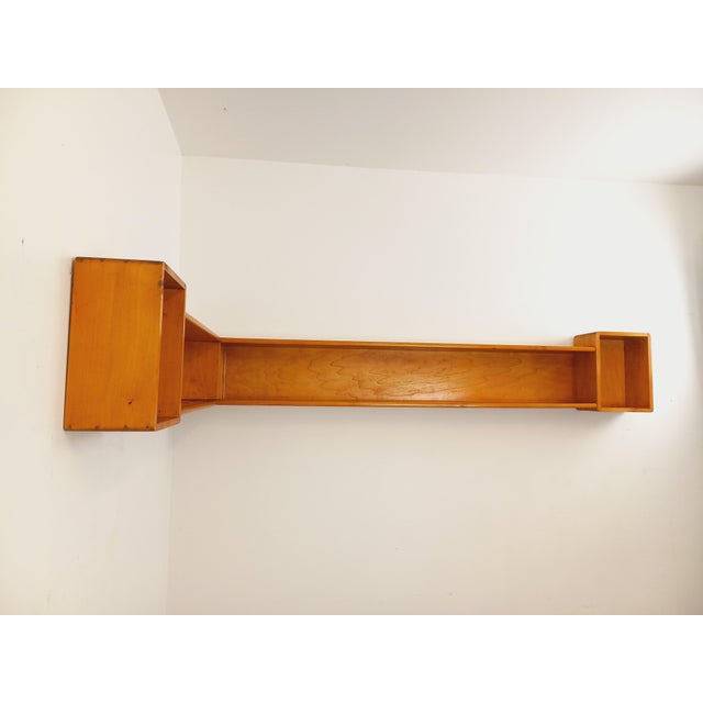 Large vintage corner wall shelf from the 1960s/70s, made of wood, in the style of Charlotte Perriand, with two small and...