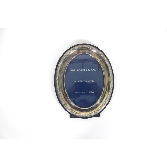 Image size: 5 x 7 in. Beautiful Silver Plated picture frame with a black velvet back and gorgeous patina, although you...