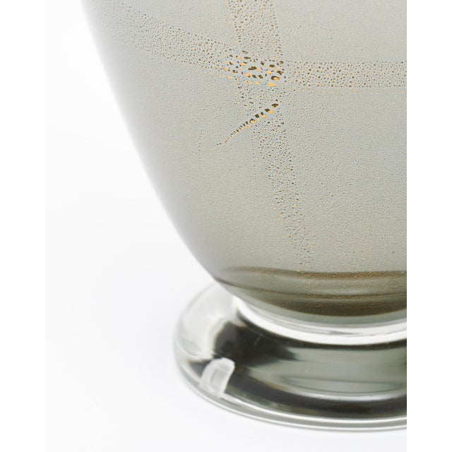 A pair of Italian hand-blown Murano glass mirrored avventurina lamps that contain 23 carat gold flecks and beautiful gray...