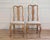 A genuine pair of period Rococo chairs dating to circa 1770, retaining traces of their original painted surfaces. The...